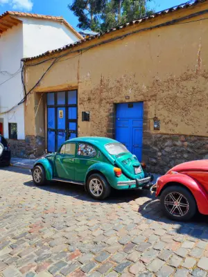 Vocho en callecita, in Mollococha. Main colors: electric blue, cinnamon, caribbean teal.